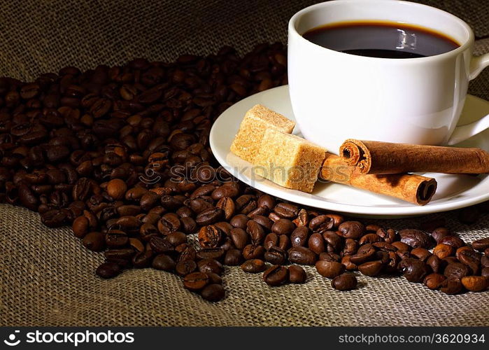 Image of coffee beans and white cup