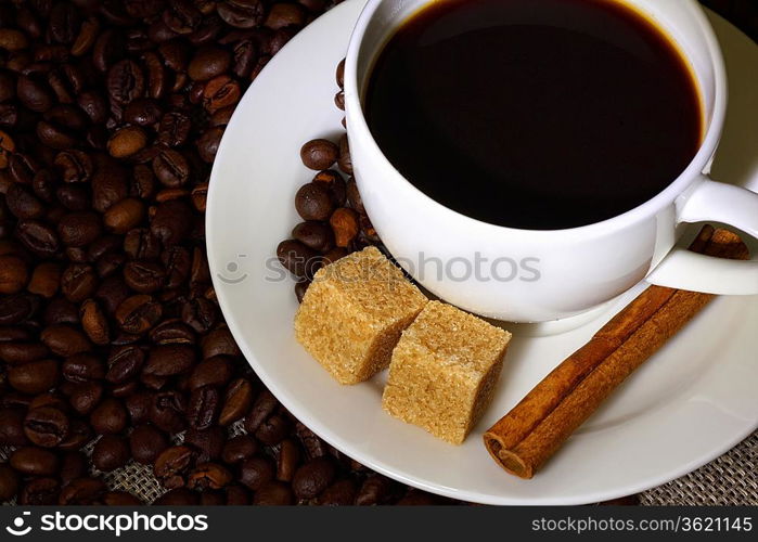 Image of coffee beans and white cup