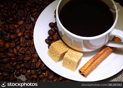 Image of coffee beans and white cup