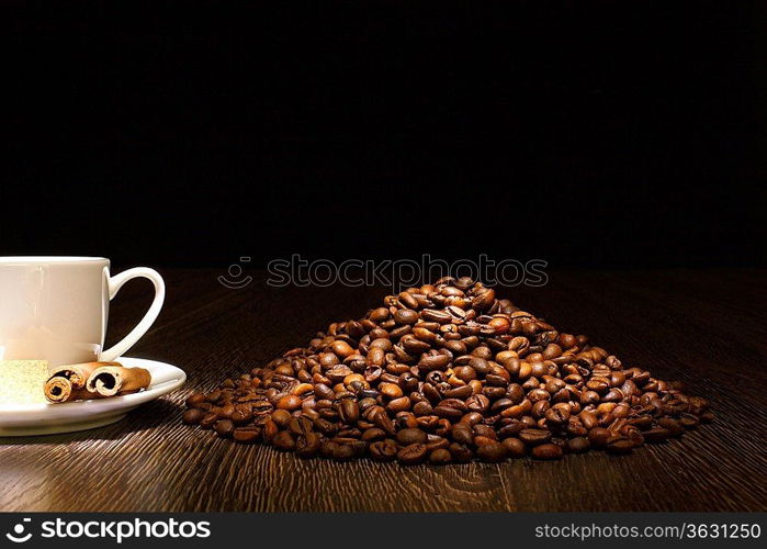 Image of coffee beans and white cup