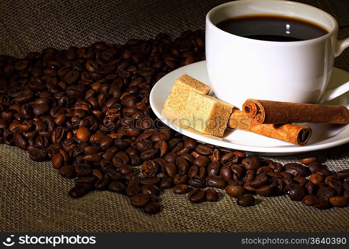 Image of coffee beans and white cup