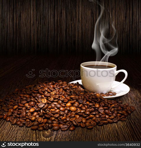 Image of coffee beans and white cup