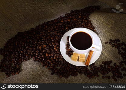 Image of coffee beans and white cup