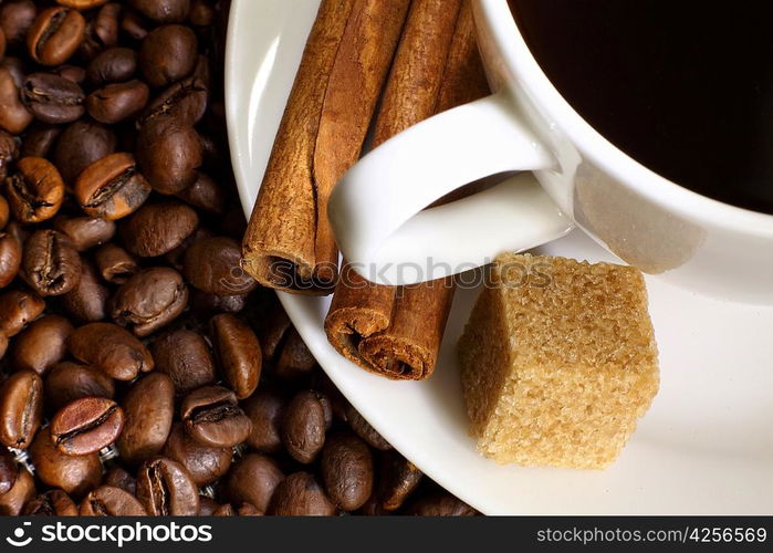 Image of coffee beans and white cup