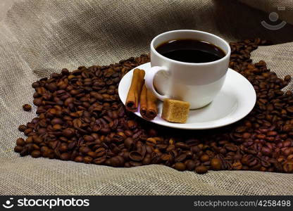 Image of coffee beans and white cup