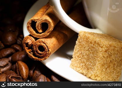 Image of coffee beans and white cup