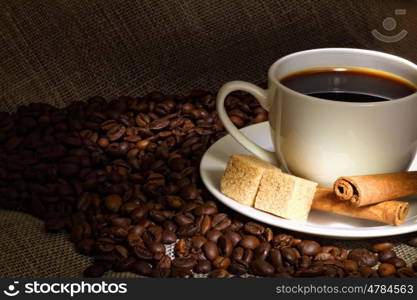 Image of coffee beans and white cup