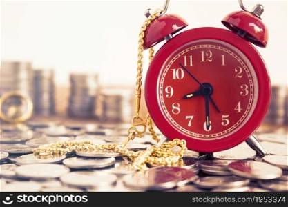 Image Of Coins With Red Fashion Alarm Clock And Gold Necklace For Display Planning Money Financial And Business Accounting Concept, Time Is Money Concept With Clock And Coins, Time To Work At Make Money, Vintage Color Tone