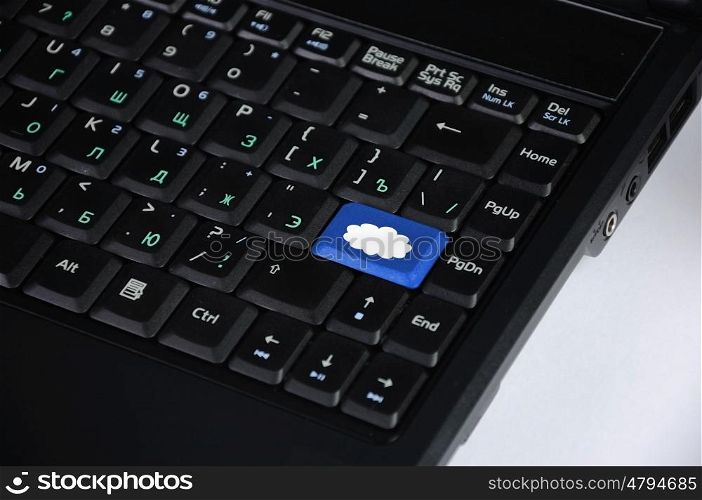 Image of computer keyboard with clous symbol on it