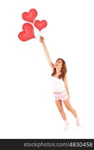 Image of cute female flying on red heart-shaped balloons, laughing woman isolated on white background, freedom lifestyle, Valentine day, romantic dream, first affection, love and happiness concept