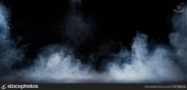 Image of dense smoke swirling in the dark interior