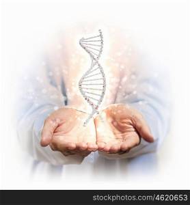 image of dna strand. Image of DNA strand against background with human hands