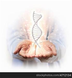 image of dna strand. Image of DNA strand against background with human hands