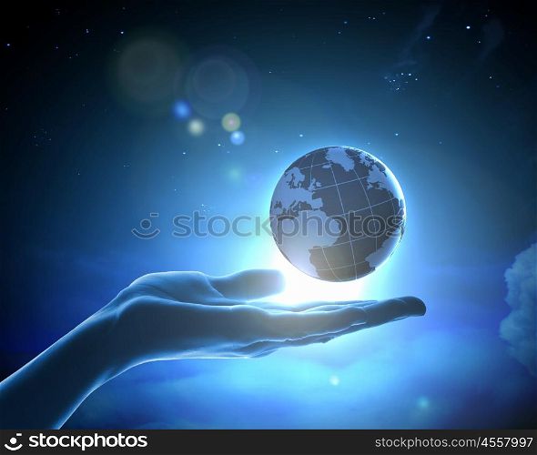 Image of earth planet on hand. Image of hand holding earth planet against illustration background