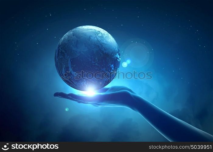 Image of earth planet on hand. Image of hand holding earth planet against illustration background