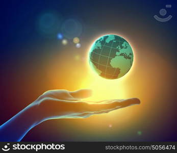 Image of earth planet on hand. Image of hand holding earth planet against illustration background