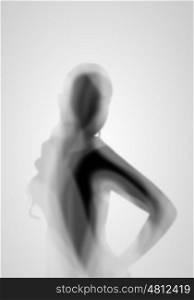 Image of female silhouette against white background