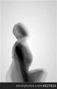 Image of female silhouette against white background
