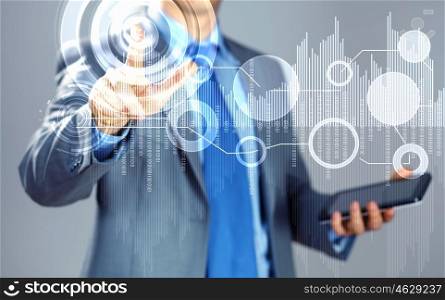 Image of finger touch. image of businessman touching screen with finger holding pad