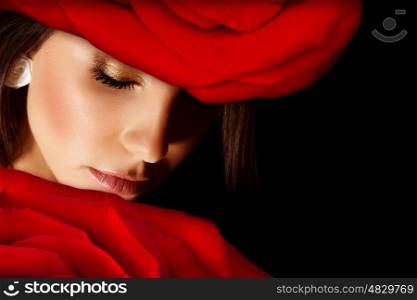 Image of glamorous woman wearing stylish floral hat, closeup portrait of beautiful arabic female with red rose on head isolated on black background, closed eyes, Valentine day, beauty salon