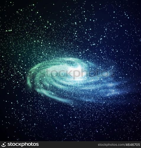 Image of glowing galaxy against black space and stars