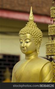 Image of golden buddha statue in temple in province tak. Thailand. (Wat Phra Mahathat)
