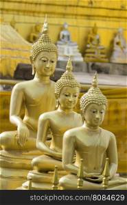 Image of golden buddha statue in temple in province tak. Thailand. (Wat Phra Mahathat)