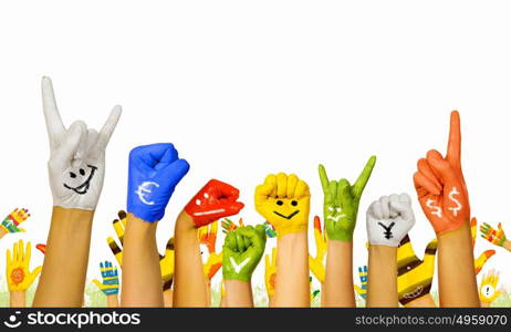 Image of human hands in colorful paint with smiles. Add color to life