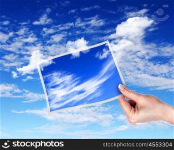 Image of light blue sky with white cloudes with frames