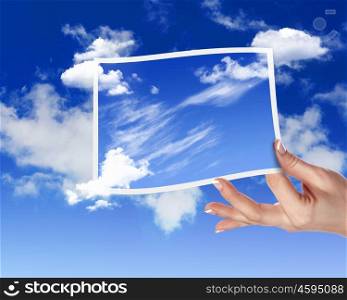 Image of light blue sky with white cloudes with frames