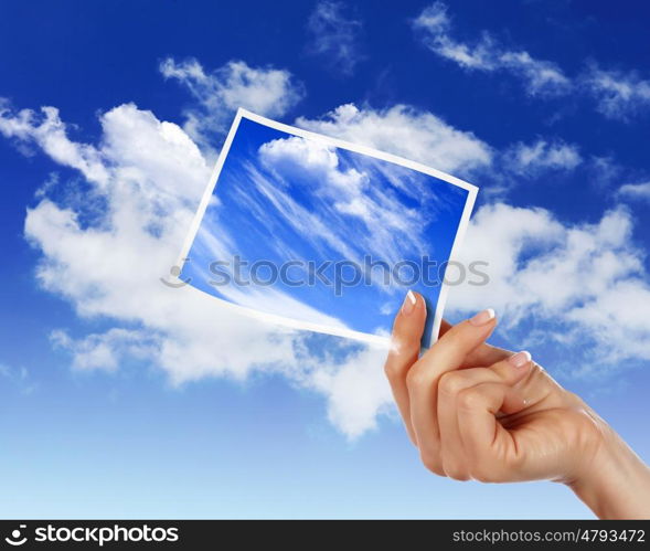 Image of light blue sky with white cloudes with frames