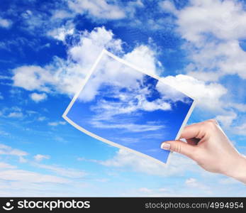 Image of light blue sky with white cloudes with frames