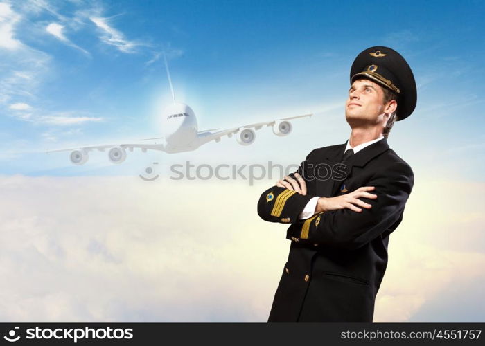 Image of male pilot. Image of male pilot with airplane at background