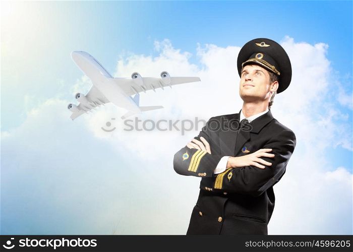 Image of male pilot. Image of male pilot with airplane at background