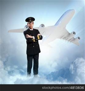Image of male pilot. Image of male pilot with airplane at background