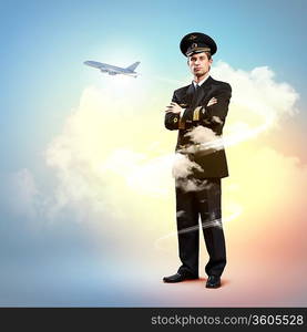 Image of male pilot with airplane flying around him