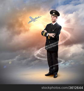 Image of male pilot with airplane flying around him