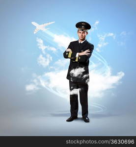 Image of male pilot with airplane flying around him