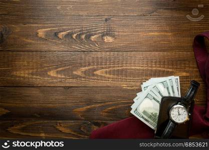 Image of money in leather purse on wood with copyspace