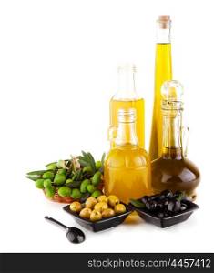 Image of olive oil still life isolated on white background, natural olives antioxidant in glass bottle and fresh olive fruit on the plate, healthy salad dressing, organic nutrition, italian cuisine