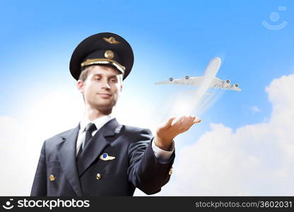 Image of pilot with airplane taking off from his hand