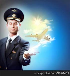 Image of pilot with airplane taking off from his hand