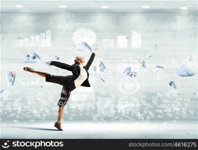 image of pretty businesswoman. Image of pretty businesswoman jumping high against financial background