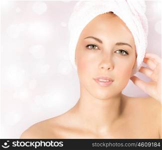 Image of pretty woman in luxury spa salon, close up portrait of cute female isolated on pink blur glowing background, attractive young lady with perfect skin enjoying dayspa, beauty treatment&#xA;&#xA;