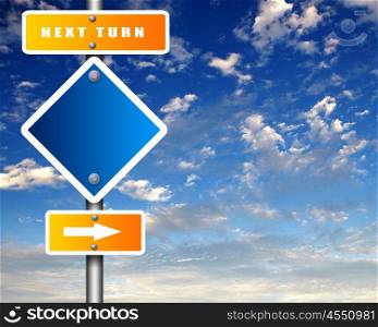 Image of road sign agaisnt blue sky