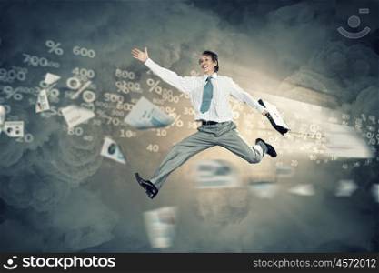 Image of running businessman. Image of a businessman jumping high against financial background