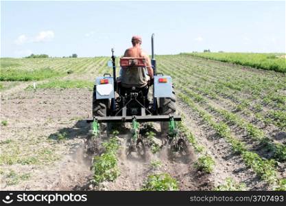 image of special equipment on a tractor for weed in agriculture