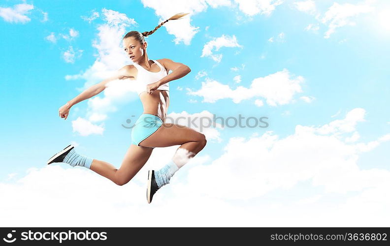 Image of sport girl in jump against cloudy background