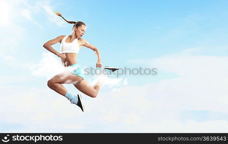 Image of sport girl in jump against cloudy background