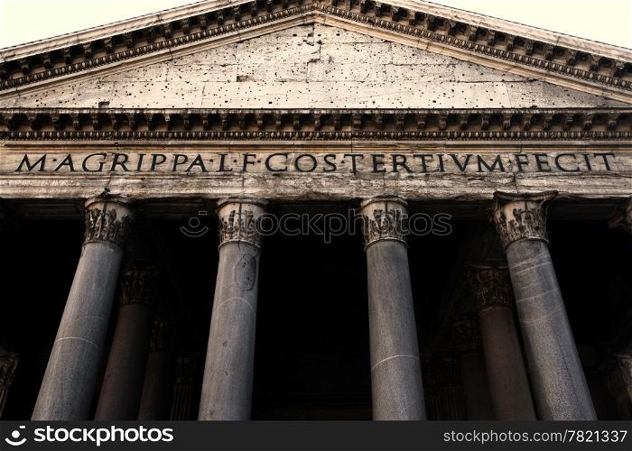 Image of the facade of the Pantheon in Rome, Italy. Shot with wide angle lens at a low angle.